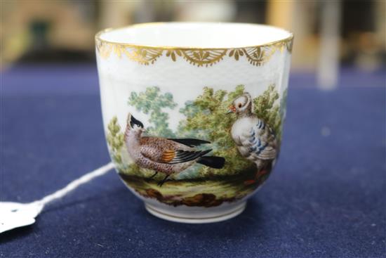 A Berlin cup and saucer, painted with birds and insects